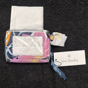 NWT Vera Bradley RFID Petite Zip Around Wallet in Palm Floral Pattern.